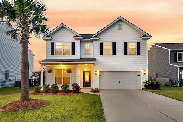 3018 Vincent Astor Dr, Johns Island, SC 29455 - traditional-style home featuring concrete driveway, a garage, and a porch