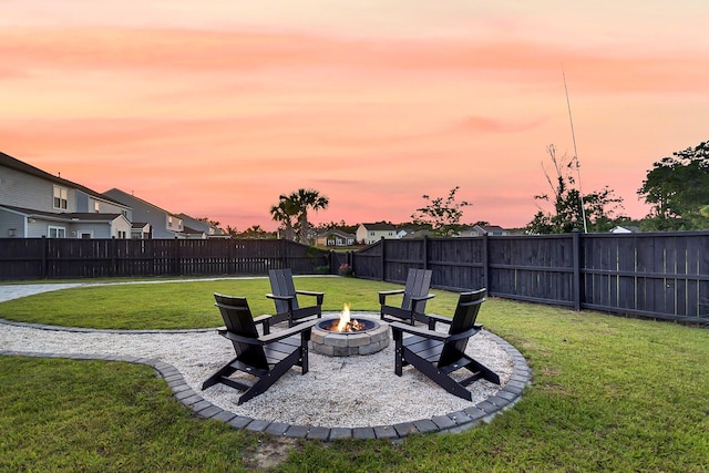 3018 Vincent Astor Dr, Johns Island, SC 29455 - fenced backyard with an outdoor fire pit