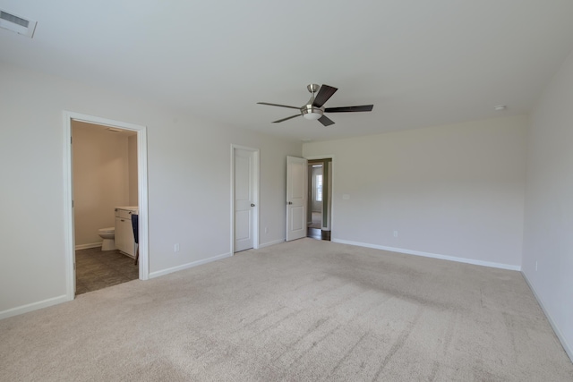 3018 Vincent Astor Dr, Johns Island, SC 29455 - unfurnished bedroom featuring light carpet, ensuite bathroom, and a ceiling fan