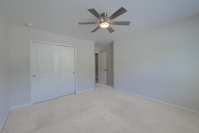 3018 Vincent Astor Dr, Johns Island, SC 29455 - unfurnished bedroom with light carpet, a closet, and ceiling fan