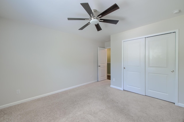 3018 Vincent Astor Dr, Johns Island, SC 29455 - unfurnished bedroom with light colored carpet, a closet, and a ceiling fan
