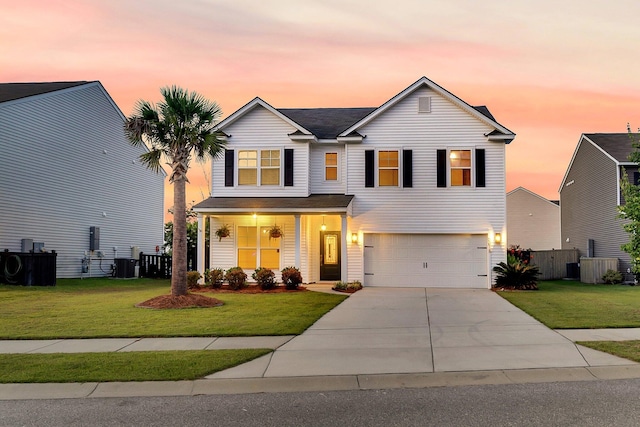 3018 Vincent Astor Dr, Johns Island, SC 29455 - traditional home with concrete driveway, an attached garage, and a porch