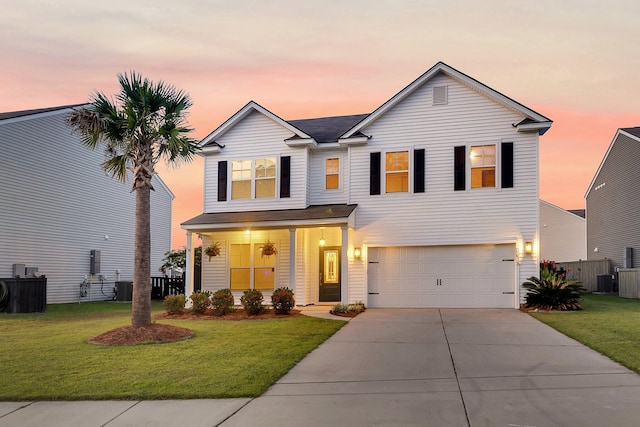 3018 Vincent Astor Dr, Johns Island, SC 29455 - traditional home featuring an attached garage, driveway, and covered porch
