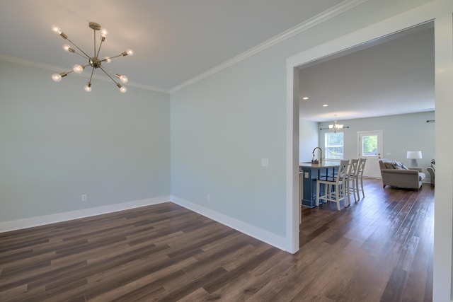 3018 Vincent Astor Dr, Johns Island, SC 29455 - spare room featuring a chandelier, dark wood finished floors, and crown molding