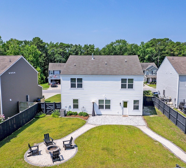 3018 Vincent Astor Dr, Johns Island, SC 29455 - rear view of property with an outdoor fire pit, a patio area, a fenced backyard, and a gate
