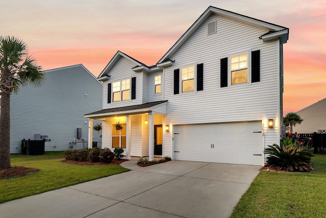 3018 Vincent Astor Dr, Johns Island, SC 29455 - traditional-style house with a front lawn, an attached garage, concrete driveway, and covered porch