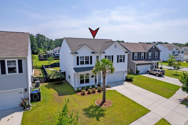 3018 Vincent Astor Dr, Johns Island, SC 29455 - traditional-style home featuring an attached garage, driveway, and a residential view