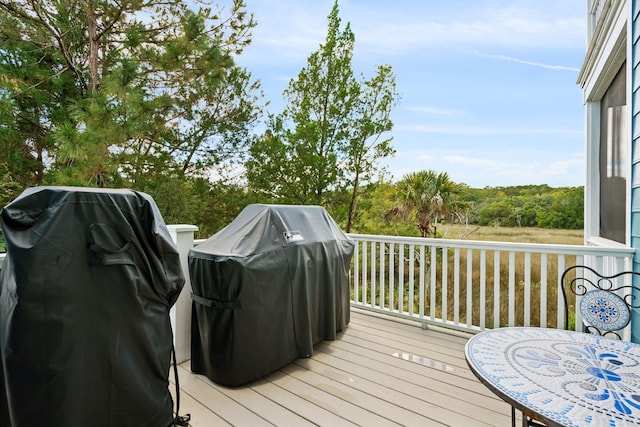 wooden terrace with grilling area