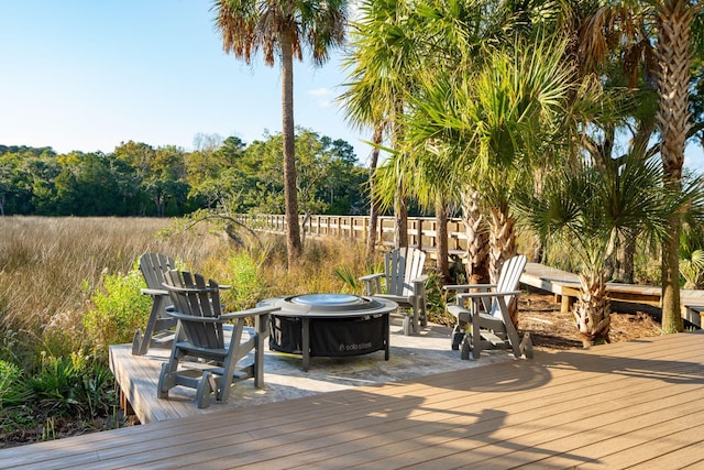 deck featuring an outdoor fire pit