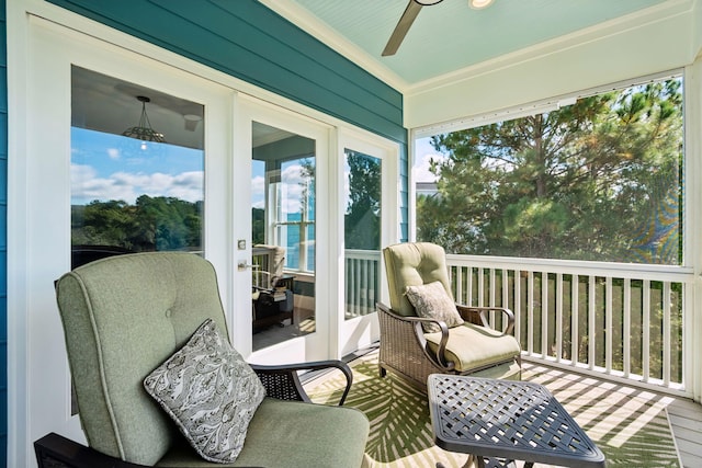 sunroom / solarium with ceiling fan