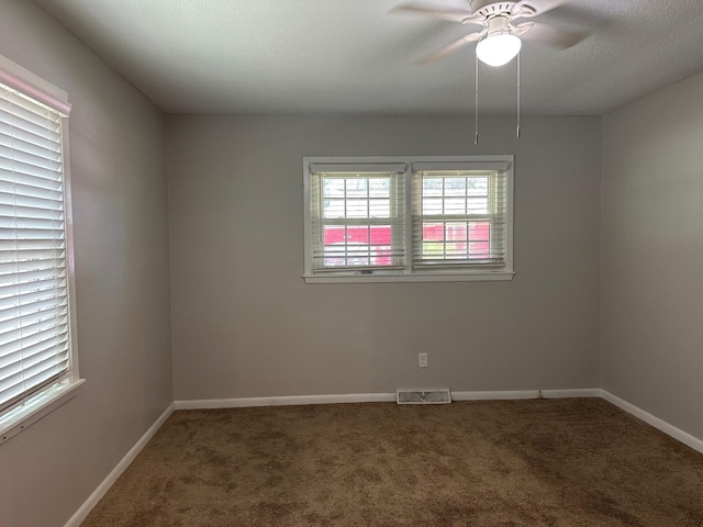 2827 Haverhill Cir N, Charleston, SC 29420 - carpeted empty room with plenty of natural light and a ceiling fan