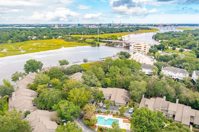 birds eye view of property with a water view