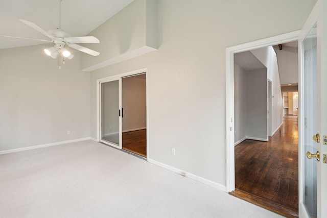 unfurnished bedroom with high vaulted ceiling, hardwood / wood-style floors, ceiling fan, and a closet