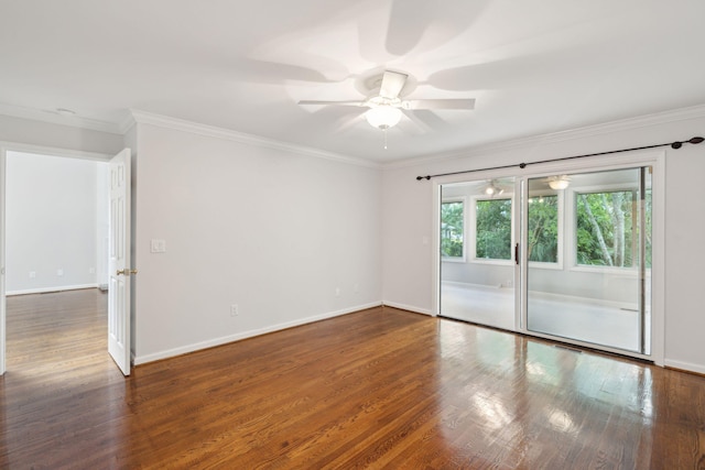 spare room with ceiling fan, ornamental molding, and dark hardwood / wood-style flooring