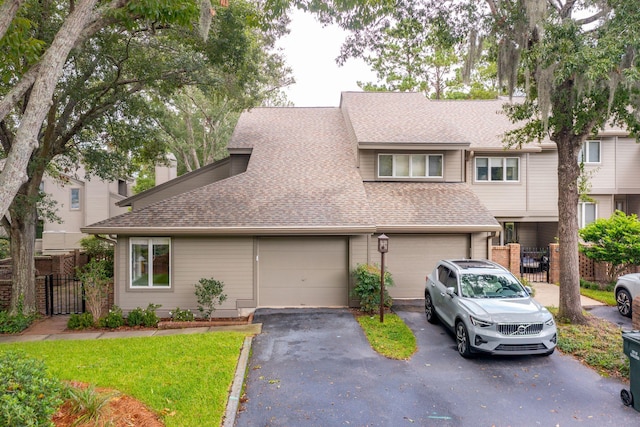 townhome / multi-family property featuring a garage