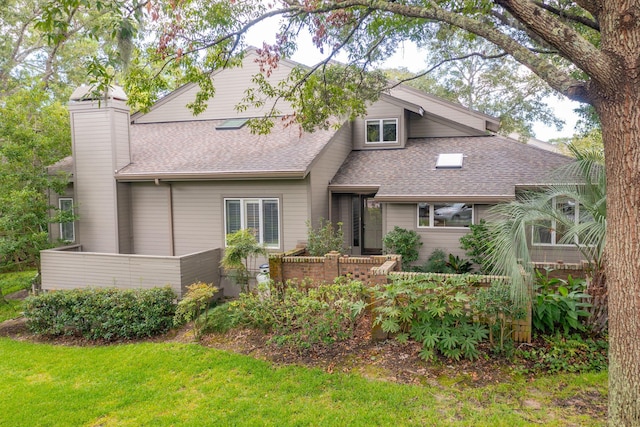 view of front of home with a front yard