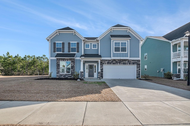 view of front of house with concrete driveway and an attached garage