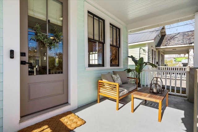 doorway to property featuring covered porch