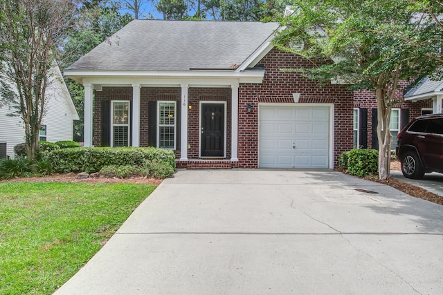 116 Venezia Ct, Ladson, SC 29456 - view of front of property with brick siding, concrete driveway, a front yard, a garage, and a shingled roof