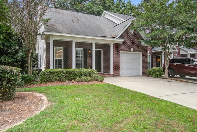 116 Venezia Ct, Ladson, SC 29456 - view of front facade with brick siding, a front lawn, concrete driveway, an attached garage, and roof with shingles