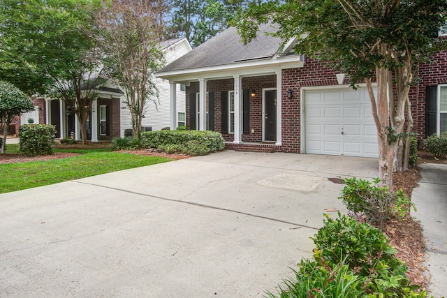 116 Venezia Ct, Ladson, SC 29456 - view of front of home with brick siding, driveway, a garage, and roof with shingles