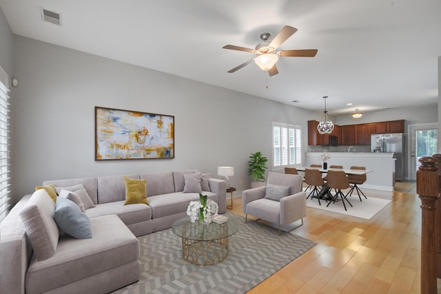 116 Venezia Ct, Ladson, SC 29456 - living room with plenty of natural light, light wood-type flooring, and a ceiling fan