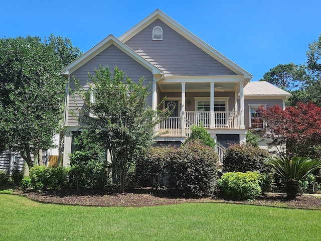 2517 Charter Oaks Dr, Mount Pleasant, SC 29466 - view of front of house with covered porch and a front yard