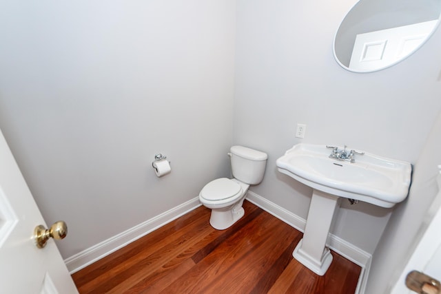 2517 Charter Oaks Dr, Mount Pleasant, SC 29466 - half bathroom featuring toilet and wood finished floors