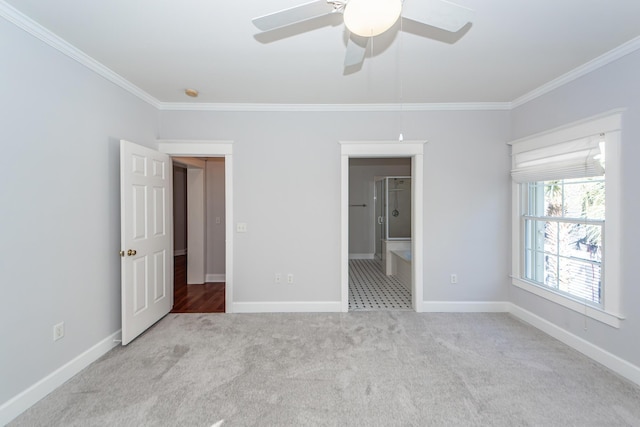 2517 Charter Oaks Dr, Mount Pleasant, SC 29466 - unfurnished bedroom featuring crown molding, carpet flooring, connected bathroom, and a ceiling fan
