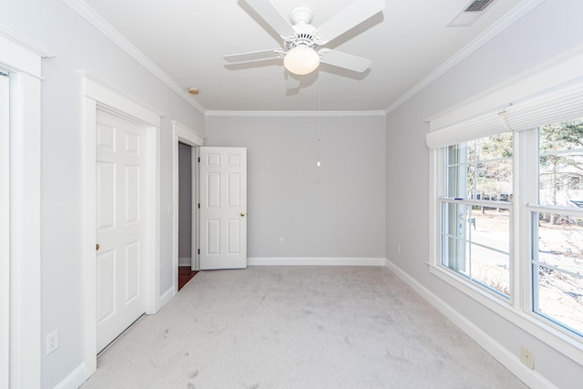 2517 Charter Oaks Dr, Mount Pleasant, SC 29466 - unfurnished bedroom with light colored carpet, crown molding, and ceiling fan