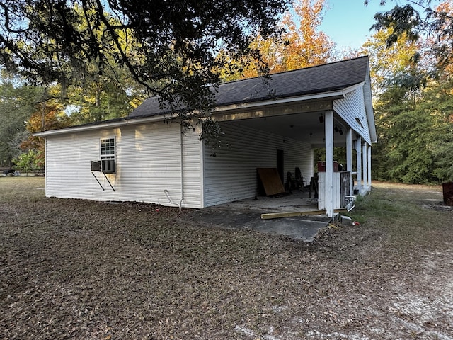 143 Fisk Rd, Dorchester, SC 29437 - exterior space with cooling unit, a patio area, roof with shingles, and a carport