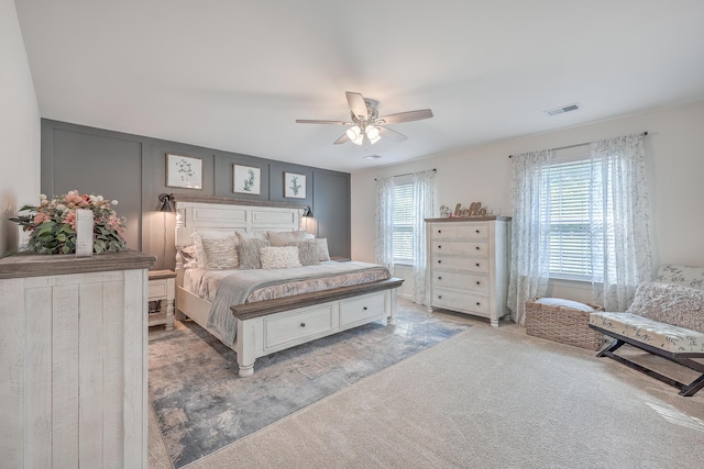 carpeted bedroom featuring ceiling fan