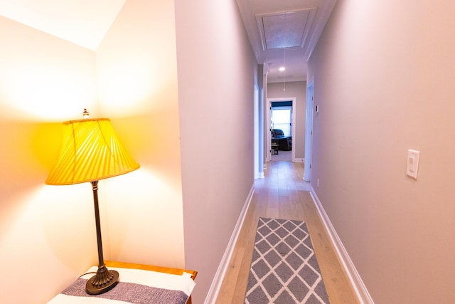 3025 Rampart Rd, Summerville, SC 29483 - hallway with attic access, wood finished floors, and baseboards