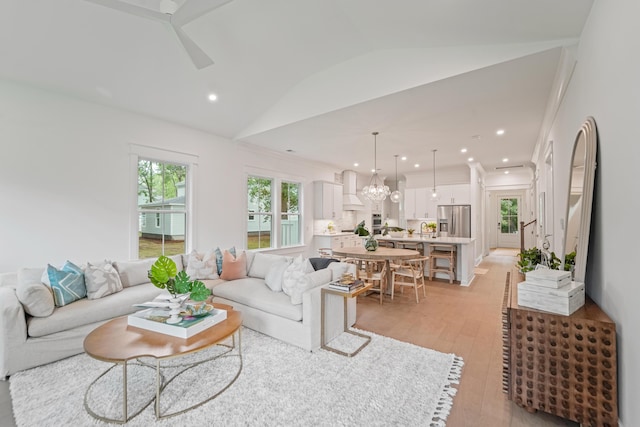 5710 Barbary Coast Rd, Hollywood, SC 29449 - living room featuring lofted ceiling, recessed lighting, light wood-type flooring, a chandelier, and ceiling fan