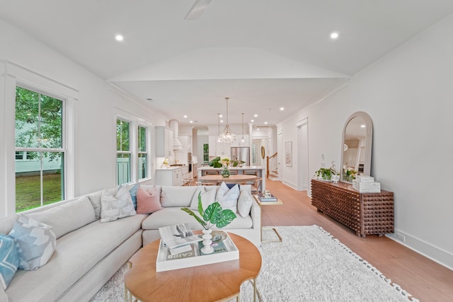 5710 Barbary Coast Rd, Hollywood, SC 29449 - living area with light wood-style flooring, lofted ceiling, a chandelier, recessed lighting, and ornamental molding