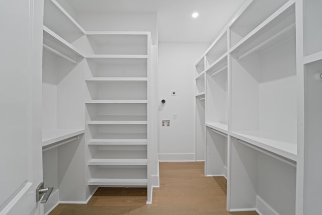 5710 Barbary Coast Rd, Hollywood, SC 29449 - walk in closet with wood finished floors