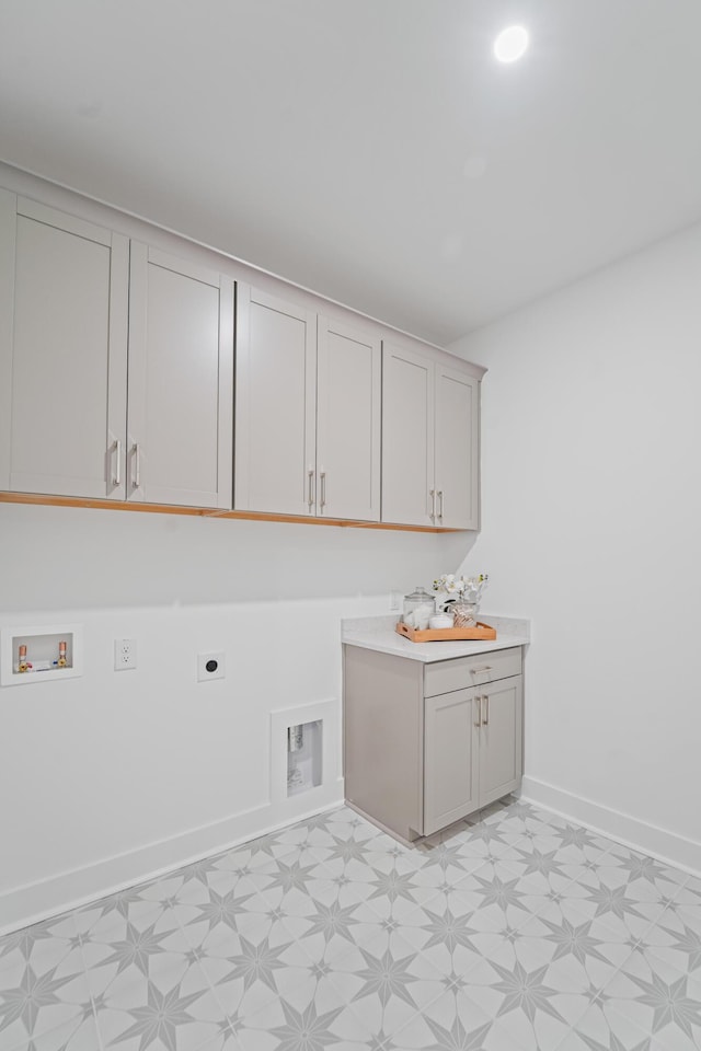 5710 Barbary Coast Rd, Hollywood, SC 29449 - laundry room with electric dryer hookup, light floors, hookup for a washing machine, and cabinet space