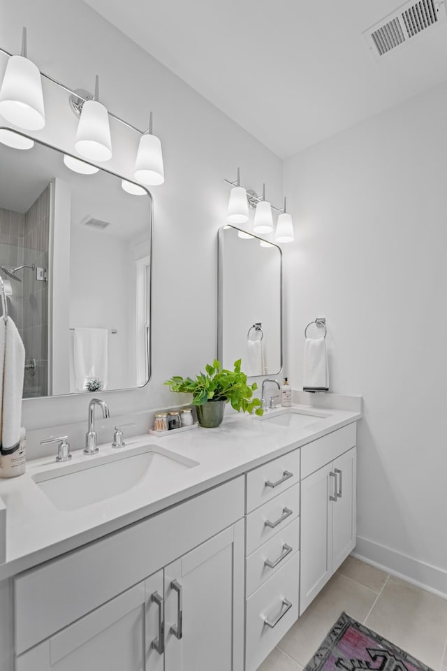 5710 Barbary Coast Rd, Hollywood, SC 29449 - bathroom featuring double vanity, tile patterned flooring, and a stall shower