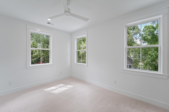 5710 Barbary Coast Rd, Hollywood, SC 29449 - unfurnished room featuring healthy amount of natural light, ceiling fan, and carpet