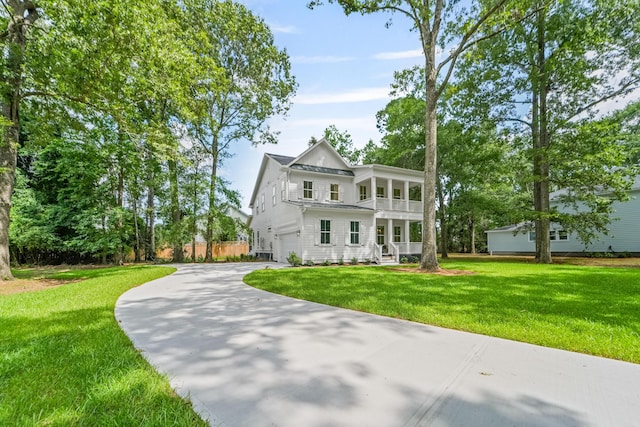 5710 Barbary Coast Rd, Hollywood, SC 29449 - view of front facade with a garage, driveway, and a front lawn