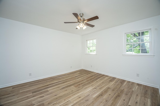 100 Colonial Dr, Goose Creek, SC 29445 - spare room with baseboards, a ceiling fan, and wood finished floors