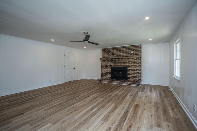 100 Colonial Dr, Goose Creek, SC 29445 - unfurnished living room featuring recessed lighting, baseboards, ceiling fan, a brick fireplace, and wood finished floors