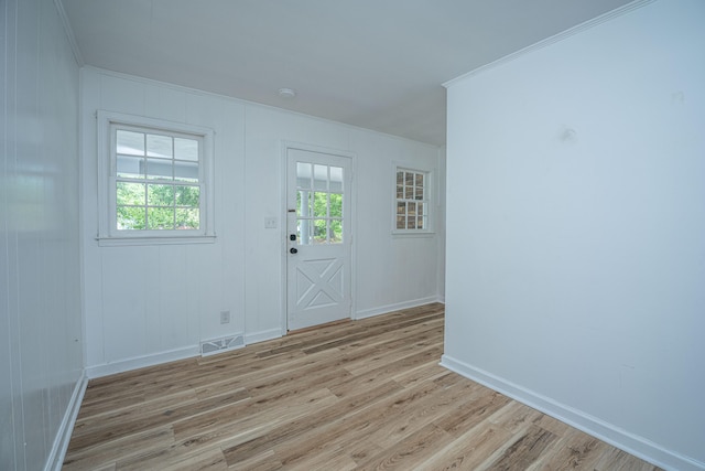 100 Colonial Dr, Goose Creek, SC 29445 - unfurnished room featuring light wood finished floors, ornamental molding, baseboards, and visible vents