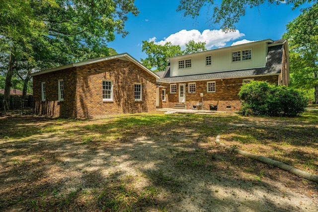 100 Colonial Dr, Goose Creek, SC 29445 - back of house featuring brick siding, fence, a patio, crawl space, and entry steps