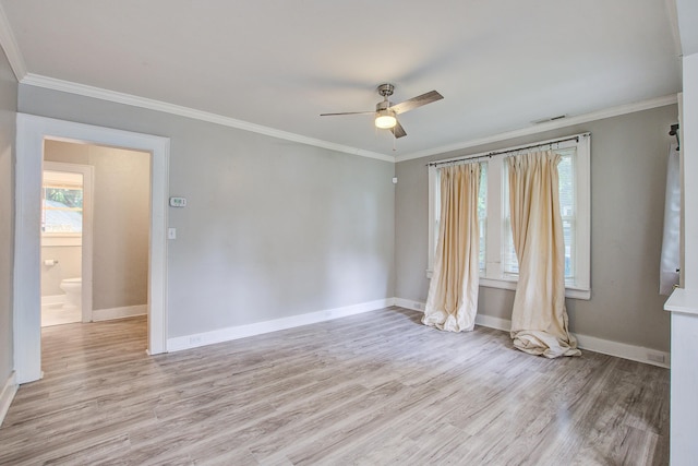 2702 Decatur St, North Charleston, SC 29405 - empty room featuring light wood-style flooring, a ceiling fan, baseboards, and crown molding