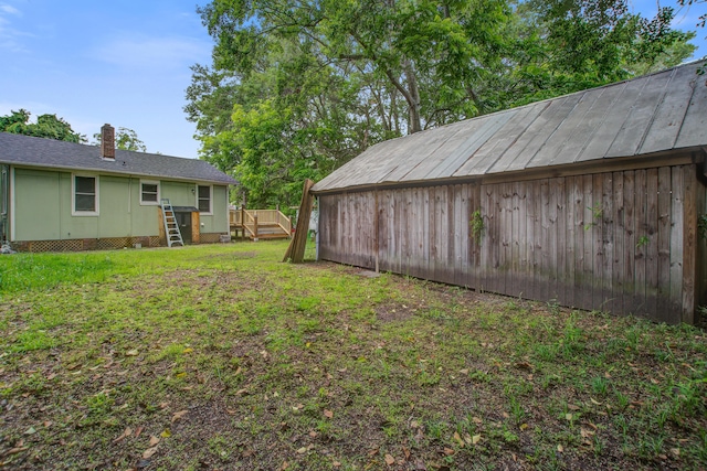 2702 Decatur St, North Charleston, SC 29405 - view of green lawn with a wooden deck