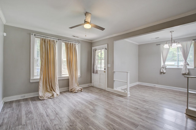 2702 Decatur St, North Charleston, SC 29405 - foyer with wood finished floors, baseboards, ceiling fan, crown molding, and a chandelier