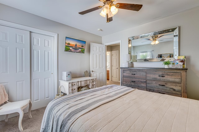 bedroom with carpet, a closet, and a ceiling fan