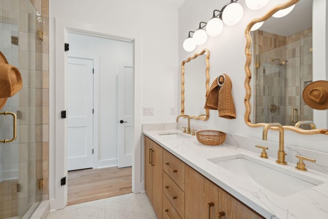 1012 E Erie Ave, Folly Beach, SC 29439 - full bathroom featuring a shower stall and double vanity