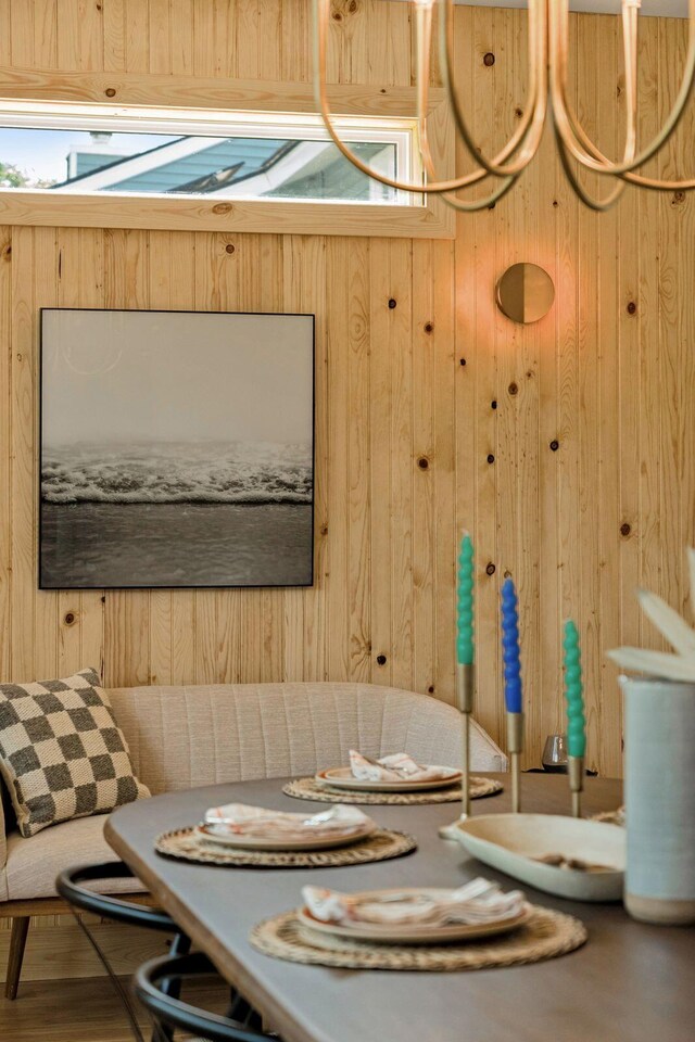 1012 E Erie Ave, Folly Beach, SC 29439 - dining room featuring wood walls
